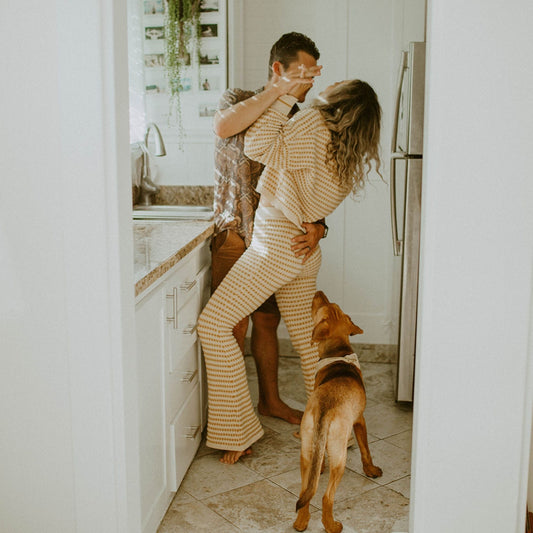 healthy relationship couple dancing in kitchen together